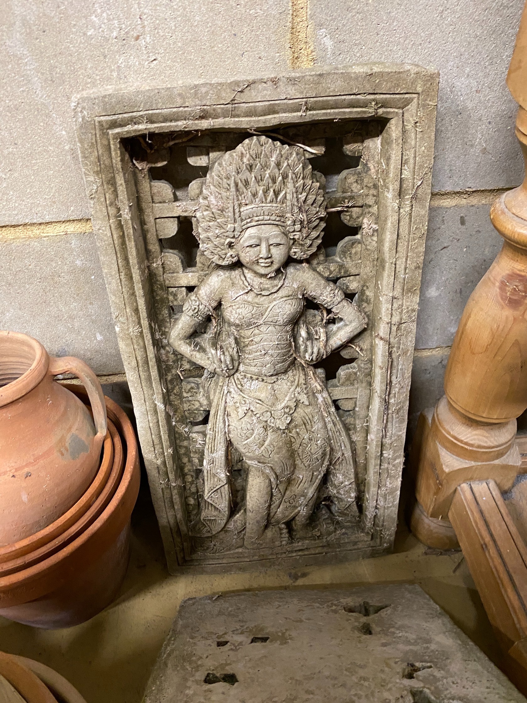 A pair of rectangular reconstituted stone Eastern style garden wall plaques, width 31cm, height 61cm